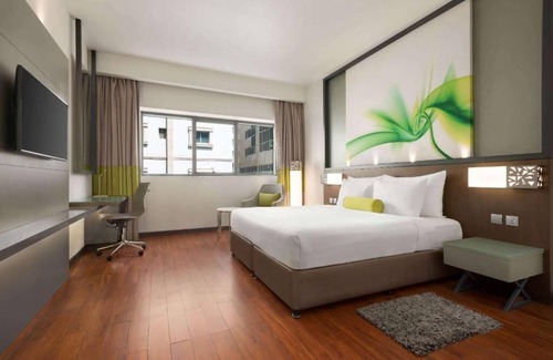 Al Muraqqabat Hotel | Deluxe Room Near Al Rigga Metro By Luxury Bookings