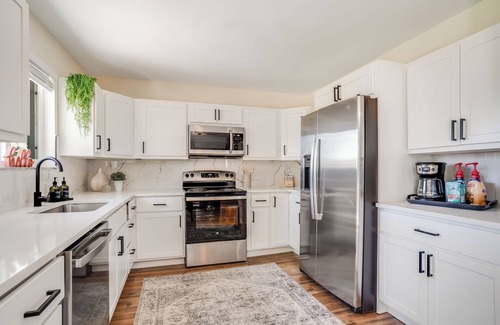 Northglenn House | Denver Retreat w/Hot Tub & Game Room – Sleeps 16 ~ 6 BR