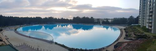 El Tabo Apartment | Depto con piscina y laguna artificial en Las cruces