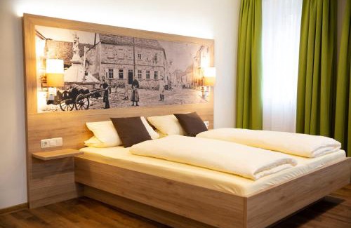 Grosslangheim Hotel | Der Patrizierhof - Weingut Gasthof Hotel - Familie Grebner