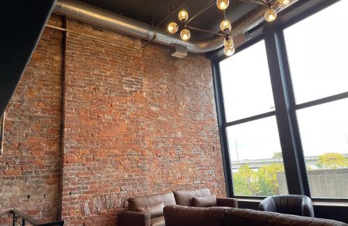 West Main Historic District Apartment | DerbyCity Plush Loft Gather in Style by Hollyhock