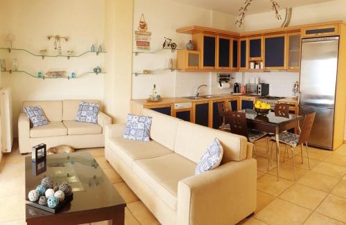 Egira Apartment | Derveni Seaside Apartments - Deluxe Sea View Penthouse Jacuzzi-BBQ & Groundfloor Garden View Apartment