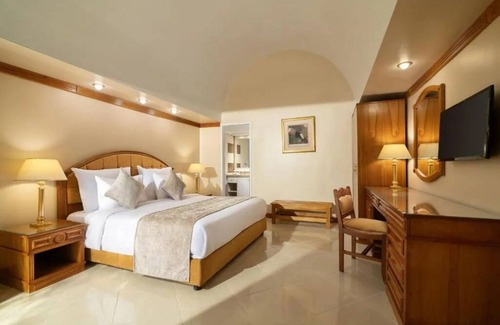 Wadi El Natrun Resort | Desert Oasis with Kids Club, Pool & Spa Access l 2 Rooms with Garden View