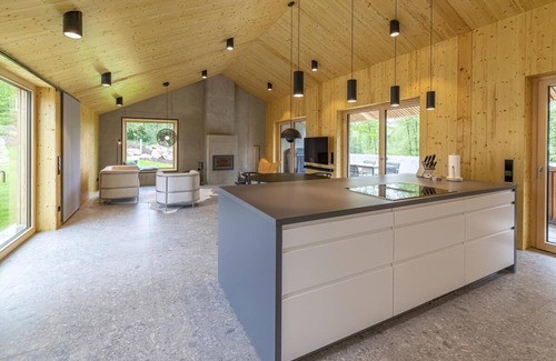 Blaufelden House | Design architect house, large fenced garden, fireplace, Klafs sauna, large windows and courtyard in the countryside