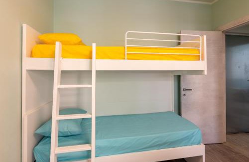 Quartiere XXIV Don Bosco Apartment | Design 50 meters from the sea - AC - WIFI - for 6 people