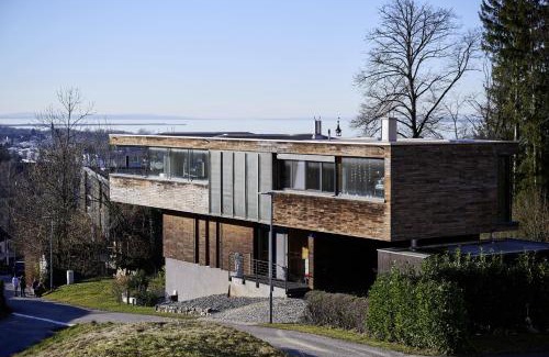 Bregenz Apartment | Design Apartment mit Panoramafenster & Naturblick - KLIMATISIERT