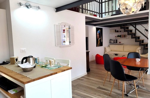 Pisogne Apartment | Design apartment with sun terrace and a 5-minute walk from the lake