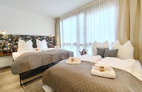 Mitte Apartment | Design-Apartmenthaus für bis zu 12, modern, Dachterrasse, Grill, ruhige Lage, Disney plus, Wii, LAN und WLAN
