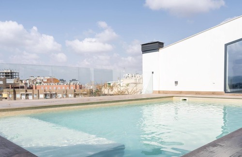 Santiago y Zaraiche Apartment | Design flat for 2 people with communal swimming pool and gym.