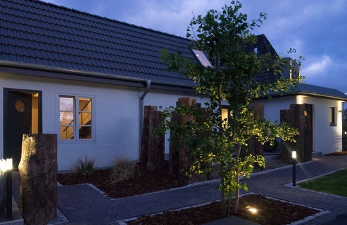 St. Peter-Ording Apartment | Design studio on 2 levels. Pool, sauna, garden, terrace.