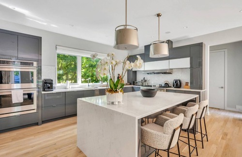 Water Mill House | Designer Gut Renovated Farmhouse on over 1 Acre, Numerous Spacious Living.