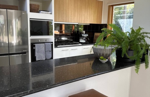 Mount Clear House | Designer home surrounded by beautiful garden- secure parking, remote check in