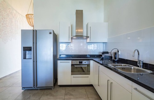 Willemstad Apartment | Designer penthouse-amazing view-private beach-walk to Mambo Beach-family rental