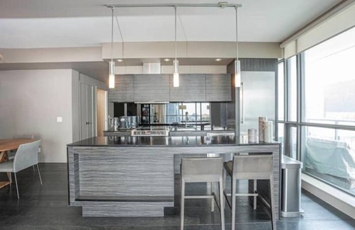 Fashion District Apartment | Designer Penthouse with Grand Piano & Lake Views