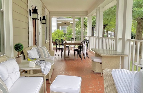 Pettigru Street Historic District House | Designer Retreat in Quaint Historic District w Front Porch Dining under the oaks