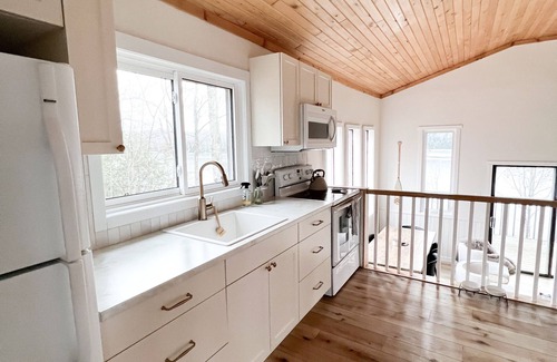Marmora and Lake Cottage | Designer waterfront, south facing cabin on deep clean lake.