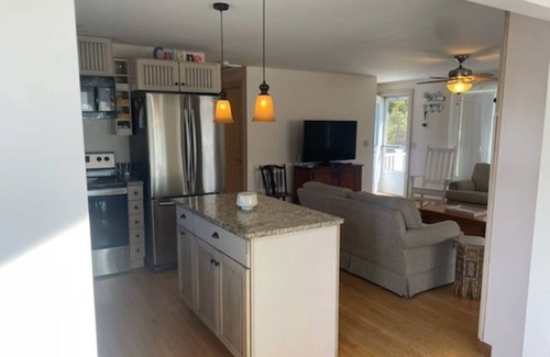 Snug Harbor House | Desirable Snug Harbor location walking distance to beach & restaurants!