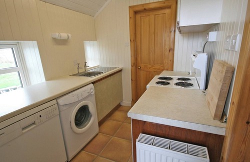 Kilmaluag Cottage | Detached croft cottage in an elevated position above Aird Bay in the spectacular north of Skye.