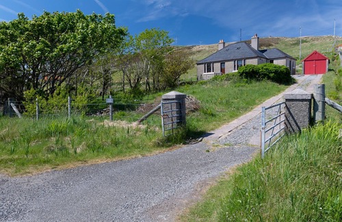 Arnol House | Detached spacious Isle of Lewis cottage in tranquil position with loch view