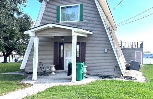 Barataria House | Devinely perfect 4-bedroom house with WiFi and AC. 100 yards from Joe's Landing