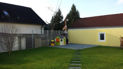 Buttenheim Apartment | Die Buttenheim Lodge - Familienfreundliche Ferienwohnung mit Garten
