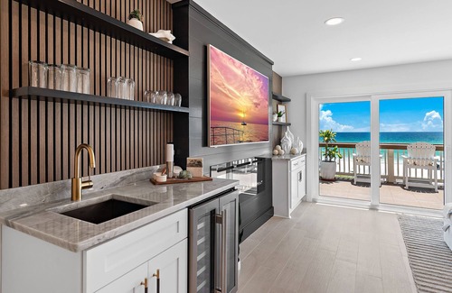 Fort Walton Beach - Destin House | Direct beachfront luxury in Destin! Enjoy sweeping Gulf views from 3 patios, private beach access with chairs & umbrellas, a movie room, pinball, and a designer kitchen with Viking & Wolf appliances. Sleeps 14 in style and comfort.