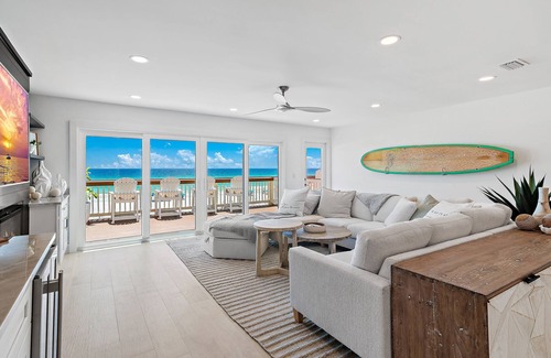 Fort Walton Beach - Destin House | Direct beachfront luxury in Destin! Enjoy sweeping Gulf views from 3 patios, private beach access with chairs & umbrellas, a movie room, pinball, and a designer kitchen with Viking & Wolf appliances. Sleeps 14 in style and comfort.