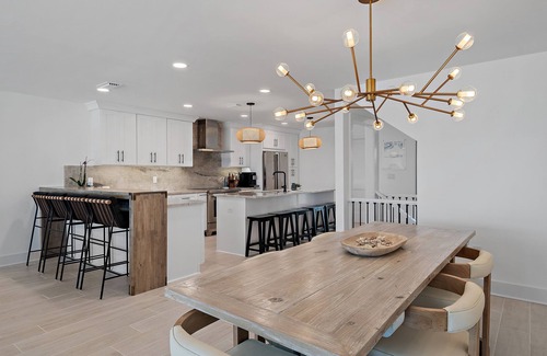 Fort Walton Beach - Destin House | Direct beachfront luxury in Destin! Enjoy sweeping Gulf views from 3 patios, private beach access with chairs & umbrellas, a movie room, pinball, and a designer kitchen with Viking & Wolf appliances. Sleeps 14 in style and comfort.