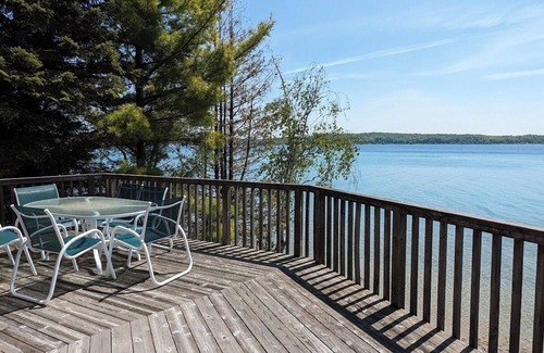 Beulah House | Direct Crystal Lake sandy swimming home. Kayaks, dock, firepit, AC Dog ok