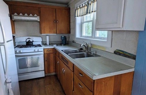 Northport House | Direct waterfront on Grand Traverse Bay , firepit, grill, large yard, pet ok