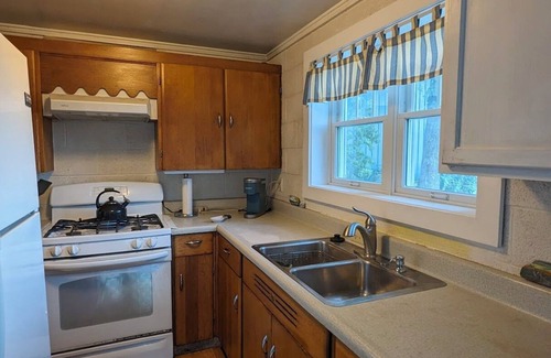 Northport House | Direct waterfront on Grand Traverse Bay , firepit, grill, large yard, pet ok