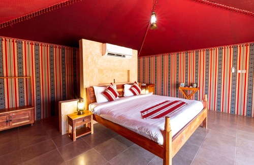 Bidiya Resort | Discover refined comfort & desert charm in Deluxe Tents at Thousand Nights Camp