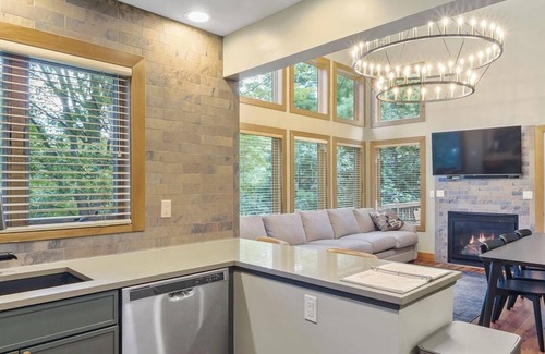 Boyne Falls Condo | Disciples Village #678 | optional lower unit expansion for rental | Fireplace