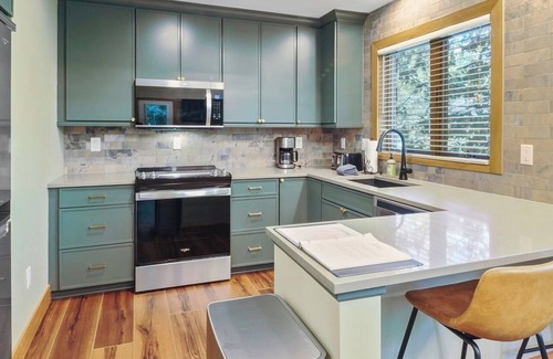 Boyne Falls Condo | Disciples Village #678 | optional lower unit expansion for rental | Fireplace