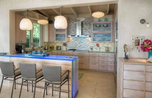 Estate Saint Quaco and Zimmerman Villa | Discover Island Girl—the ultimate stunning villa that offers breathtaking views, a refreshing pool, and luxurious air conditioning! Experience paradise like never before!