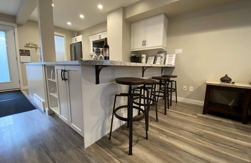 East Kootenay House | Discover modern mountain living at its finest in our beautifully renovated ski-in/ski-out townhouse.