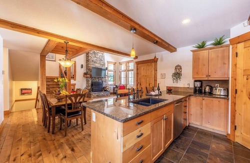 East Kootenay House | Discover mountain serenity at its finest in our stunning home, complete with a soothing hot tub.
