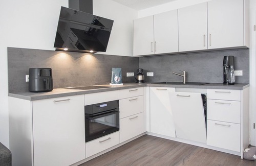 Zueschen Apartment | Discover our cozy holiday cottage in Winterberg. Perfect for 5 people, close to the slopes and with beautiful views. Book your dream vacation now!