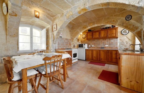 San Lawrenz House | Discover Tranquility: rustic elegance in this beautifully converted farmhouse.