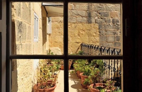 San Lawrenz House | Discover Tranquility: rustic elegance in this beautifully converted farmhouse.