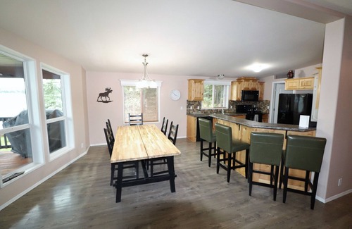 Deka Lake House | Discover Tranquility: Your Own 1-Acre Oasis on the Lakefront