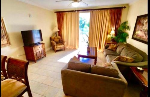 Florida Central Atlantic Coast Apartment | Disney 1 mile , Blue Heron 1 room 2 bath,amenities,6 guests, walk to restaurants, no fees at check in