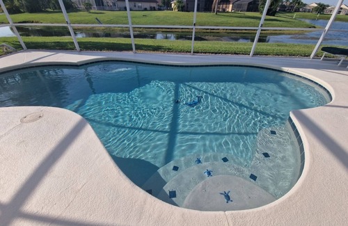 Eagle Pointe South Villa | Disney, quiet, beautiful, south facing, lake view, pool, modern, luxury