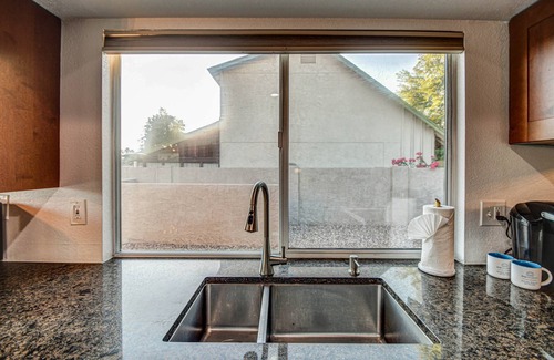 Chandler House | Dive Into Fun: Pool with Diving Board, Arcade, & Classic Cocktails! Pet-Friendly Tempe Oasis