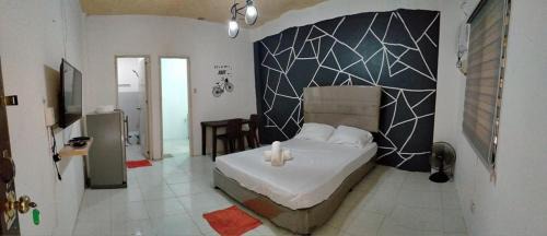 Cabanatuan Apartment | DJCI Apartelle Walk to Robinson & NE Pacific Mall 3 Min to SM Cabanatuan