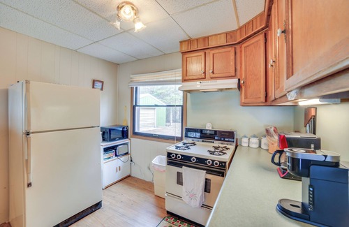 Gould City Cottage | Dock & Fire Pit: Lakefront Cottage in Gould City!