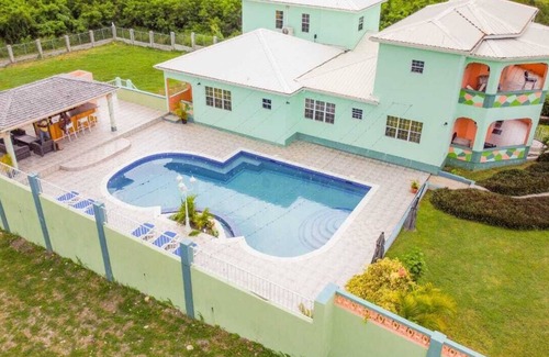 Saint Peter Parish Apartment | Docs paradise Green Apartment