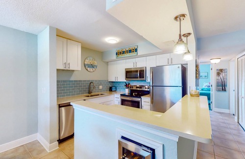 North Redington Beach Condo | Dog-friendly condo with pool, fitness area, balcony, fast WiFi, & W/D