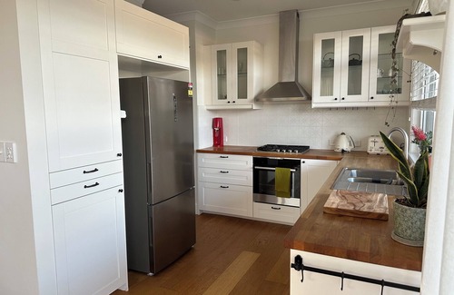 Arrawarra Headland Apartment | Dog friendly apartment close to beaches. Own private yard, garden and 2 decks.