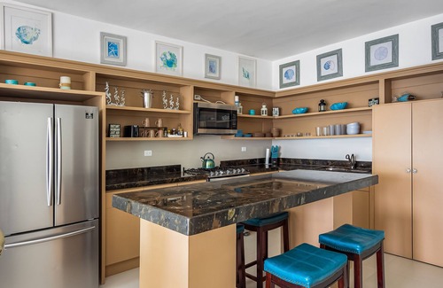 La Paloma House | Dog-friendly beachfront villa with pool & hot tub access plus rooftop deck
